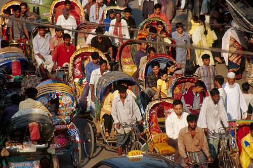 Rickshaw traffic at sunset