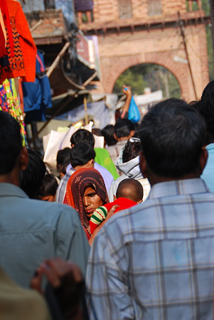 Woman moving through crowded street