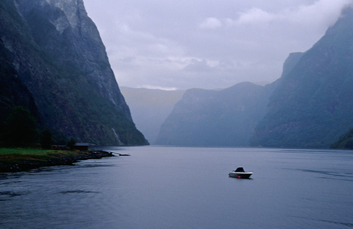 Small boat in big Fjord